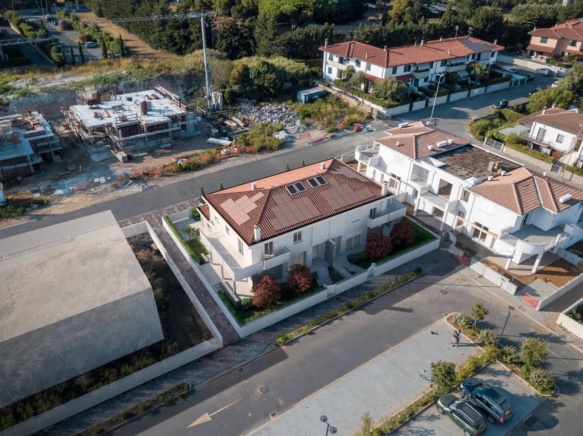 Fotoinserimento: Casa Lorenzi inserita nella foto aerea del quartiere