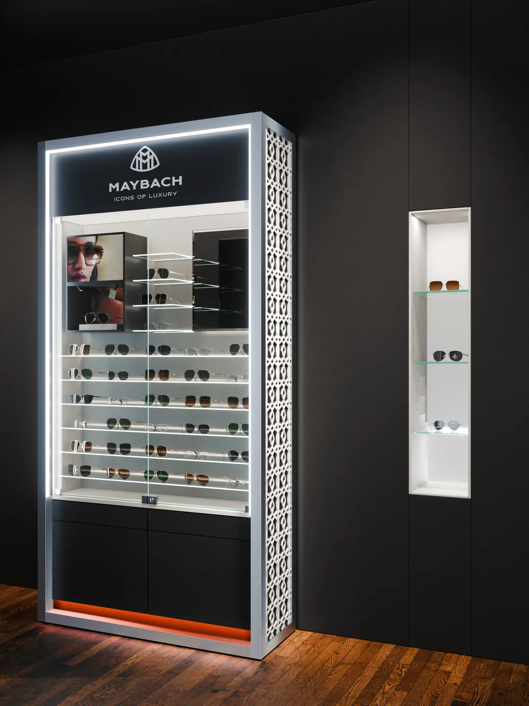 Il formato medium, largo 123 cm, con il motivo di M sul fianco: render 3D di un arredo per boutique di occhiali Maybach